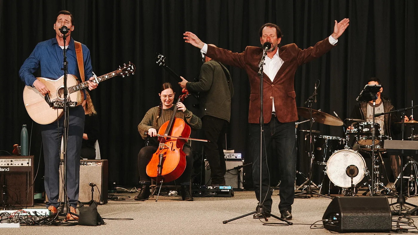 Musicians and singers worshipping together